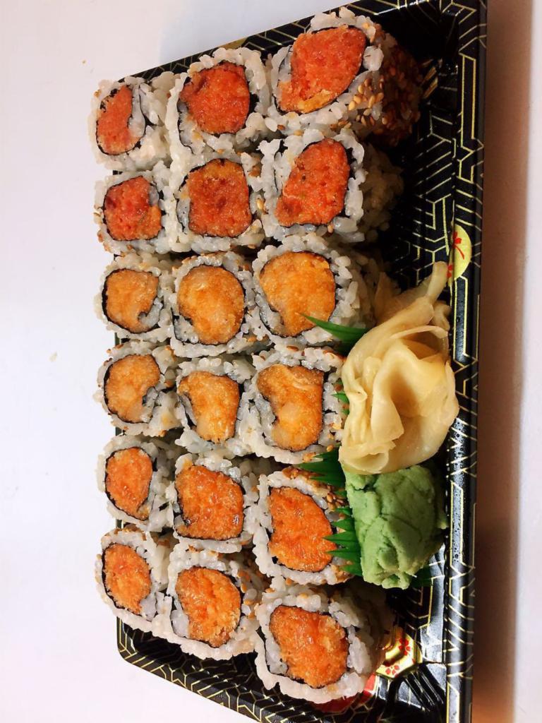 Maki Combo B · Spicy tuna, spicy salmon and spicy white tuna. Served with a side.