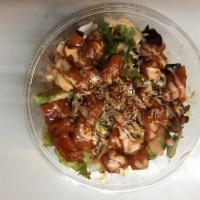 A. Salmon Poke Bowl · Salmon with spicy mayo, eel sauce, mixed green, seaweed, avocado, kani, tobiko, seaweed sala...