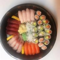 Small Party Platter D · 16 pieces sushi and 3 classic rolls. 4 of pieces tuna, 4 pieces of salmon, 4 pieces of fish,...