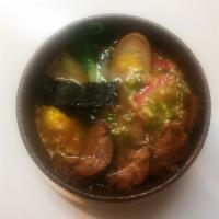 Beef Ramen · Marinated beef. Served with corn, seaweed, bamboo shoot, scallions, naruto fish cakes, enoki...