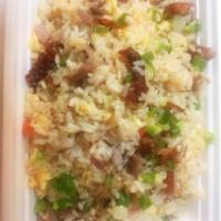 Duck Fried Rice · Served with a side.