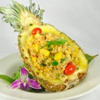 House Special Pineapple Fried Rice · Shrimp, squid, king crab and pineapple fried rice. Served with a side.