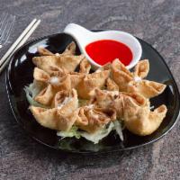 Crab Cheese Wontons · Imitation Crab I Cream Cheese I Green Onion I Sweet & Sour Sauce I 8 Pieces