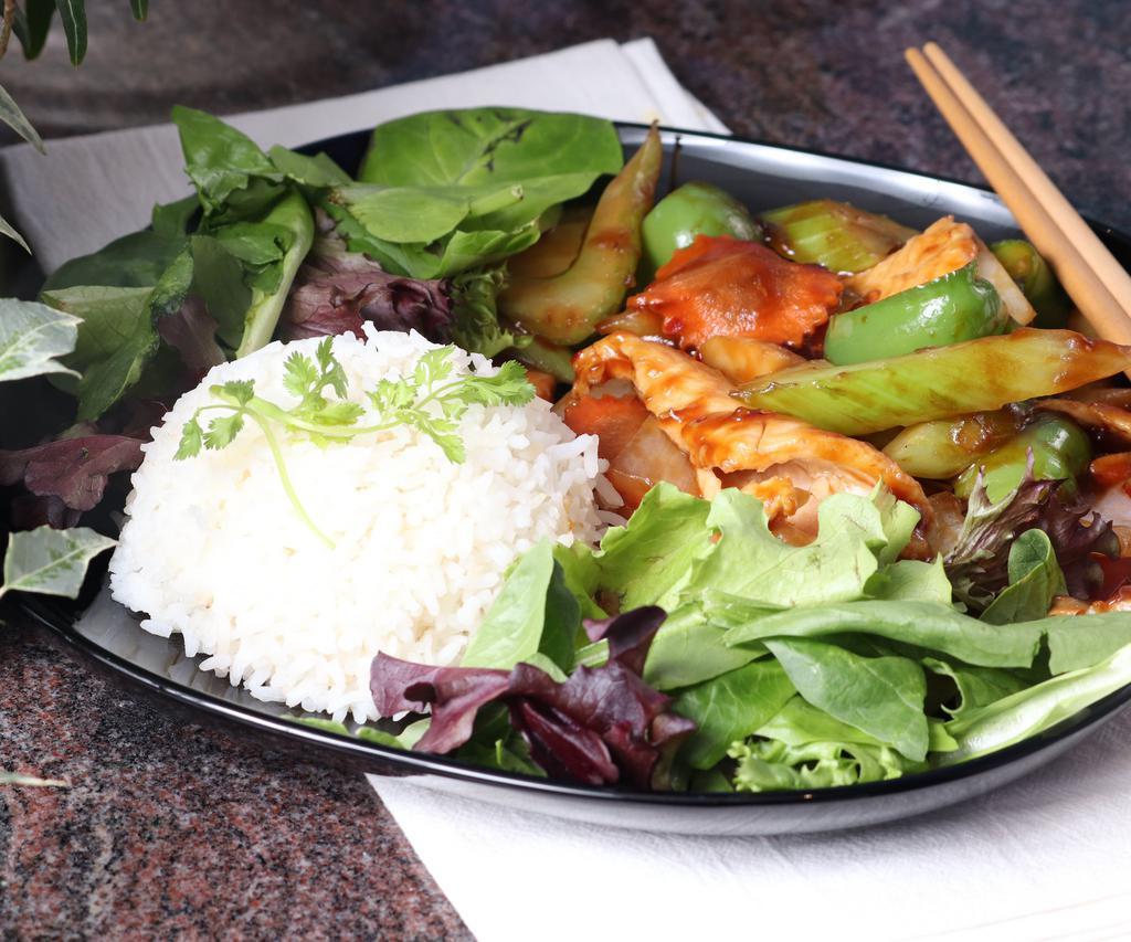 Szechuan Chicken Dinner · White chicken stir fried with bell peppers, onions, carrots, bamboo shoot, and celery. A combination packed with heat and flavor