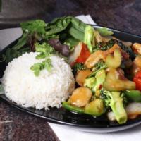 Yushan Chicken Dinner · Stir fried with broccoli, celery, bamboo shoots, onions, water chestnuts and peppers in a pu...