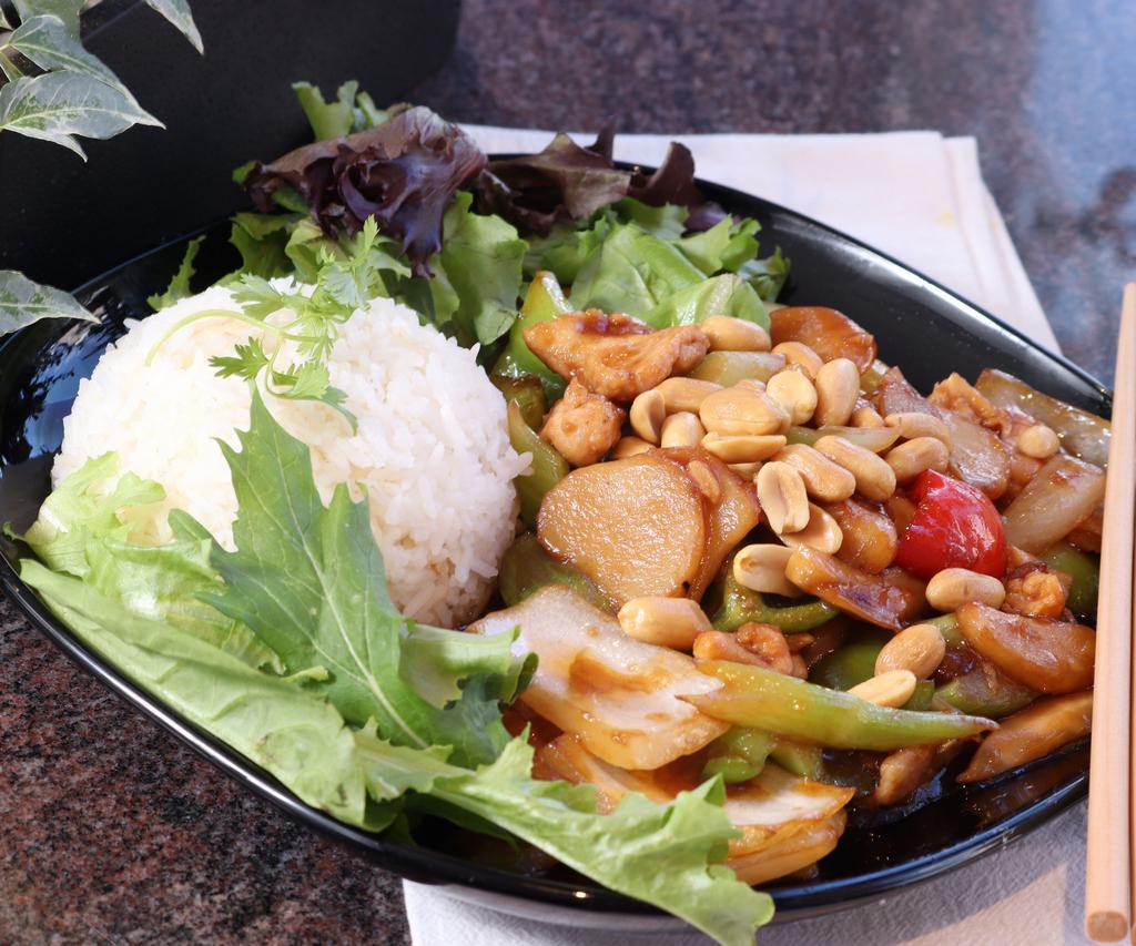 Kung Pao Chicken Dinner · Flavorful chicken stir-fried with celery, onions, water chestnuts, bamboo shoots and bell peppers in spicy Kung Pao sauce. Topped with peanuts for completion