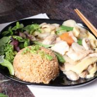 Moo Goo Gai Pan Dinner · Very light and flavorful dish with chicken, sliced mushrooms, carrots, snow peas, bamboo sho...