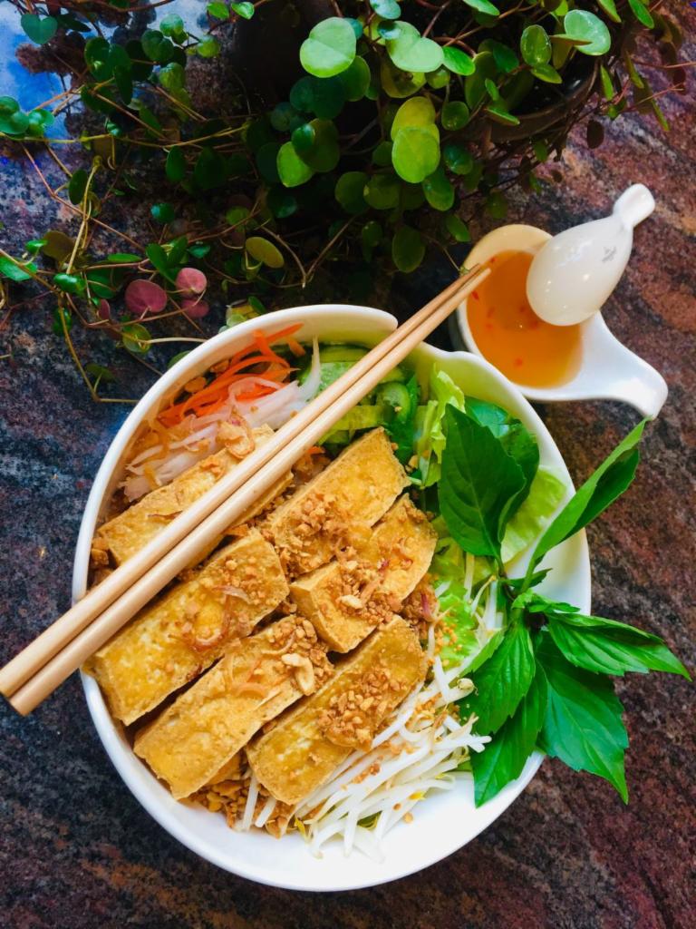 Tofu Noodle Bowl · Vermicelli Rice Noodle Bowl served with fried tofu, lettuce, cucumber, basil, bean sprouts, pickles, fried onions, crushed peanuts and chili lime sauce.
