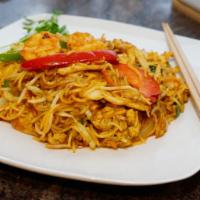 Singapore Noodles · Vermicelli noodles, chicken, shrimp, red and green bell peppers and curry powder.