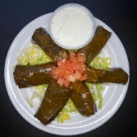Grape Leaves · 6 grape leaves stuffed with rice, onion, tomato and parsley.
