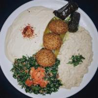 Appetizer Combo · Hummus, falafel, baba ghanoush, grape leaves and tabbouleh.