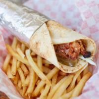 Chicken Kabob Wrap · Cabbage, garlic sauce and pickles rolled in pita bread. Served with your choice of fries or ...