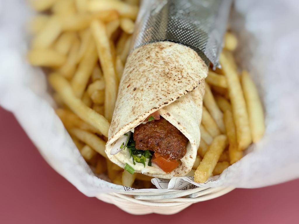 Lula Kabob Wrap · Tomato, parsley, onion and hummus wrapped in pita bread. Served with your choice of fries or salad.