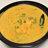 44. Salmon Curry · Salmon cooked with fresh tomato, ginger, garlic and onions. Prepared in an authentic sauce, ...