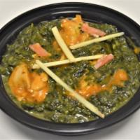 55. Chicken Saag · Chicken, spinach and green herbs. Served with rice.