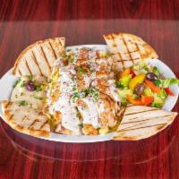 Shawarma plate · Beef, lamb, or chicken marinated in our Egyptian spices. Topped with hummus, rice, veggie sa...
