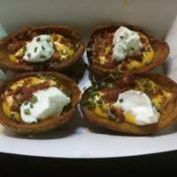 Loaded Potato Skins · Cheese, bacon, sour cream and chives.