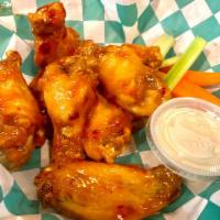 8 Pieces Wings · 8 pieces. Choice Thai Chili Honey, BBQ, Classic Buffalo. Served with celery, carrots, and bl...