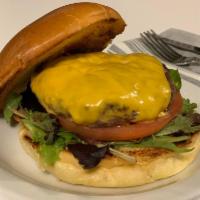 Cheese Burger Quarter Pounder · 100% All Beef Handmade burger served on Toasted Brioche Bun with American Cheese, Greens and...