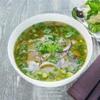 Classic Beef Pho · Thin sliced medium rare steak and well done brisket.