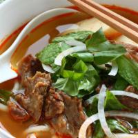 Hue Rice Noodle Soup · Beef shank, Vietnamese ham, thick rice noodles. 