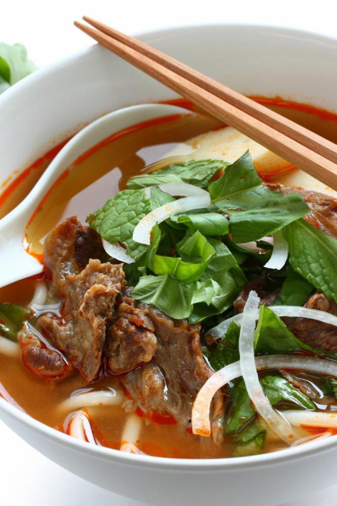 Hue Rice Noodle Soup · Beef shank, Vietnamese ham, thick rice noodles. 