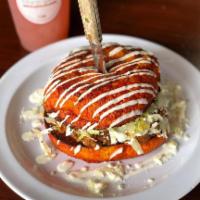 Pambazo Lunch · Torta smothered and seared in our guajillo sauce filled with a chorizo potato, lettuce, ques...