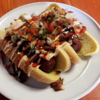 La Street Dog · Sausage link wrapped in bacon topped with pico de gallo, aioli and ketchup.