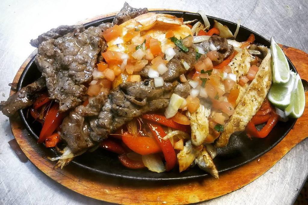 Fajita Combo · Sauteed bell peppers with onions, tomato and served on a hot skillet. Add side salad for an additional charge.