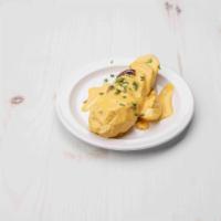 Papa Huancaina · Mouth watering tender potatoes smothered in a cheese sauce made with peruvian yellow aji.