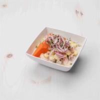 Ceviche Clasico · The nation’s pride and joy.  freshest fish lightly marinated in “leche de tigre”: lime juice...