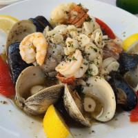 Mariscada · Shrimp, scallops, clams, mussels & choose 1 of our signature sauces.
