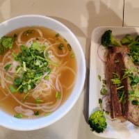 1A. Signature Short Rib Noodles Beef Soup · Savory soup made from cow meat.