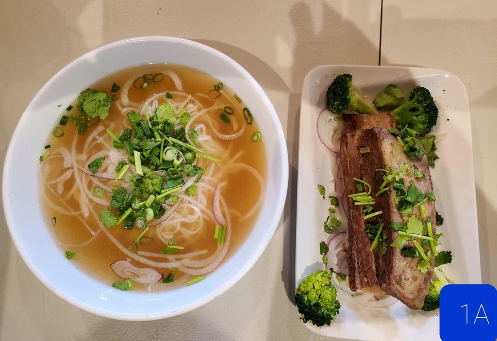 1A. Signature Short Rib Noodles Beef Soup · Savory soup made from cow meat.