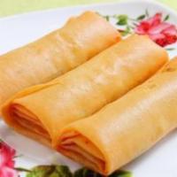 2a. Shanghai Spring Roll · 3 pieces. Crispy and vegetarian.