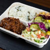 Vegan Shawarma Rice Bowl · Plant Based shawarma with a side of rice and your choice of salads from our salad bar.
