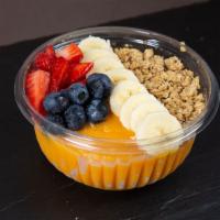 Mango Bowl · Refreshing Mango sorbet with bananas, strawberries, blueberries and granola.