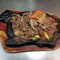 103.  Beef Bulgogi  · Stir-fried thin slices of tender rib eye beef.