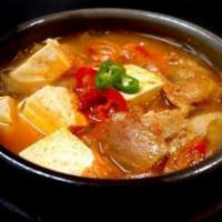 71. Kimchi Jjigae · Spicy pork kimchi soup. Hot and spicy.
