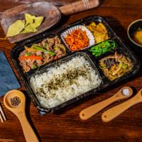 Bulgogi Bento Box · Includes Marinated Beef Bulgogi with white rice, Japchea, assorted (banchan) vegetables and ...