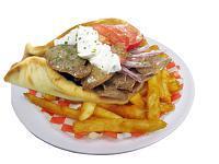 #1 Gyro Sandwich · A special combination of slowly cooked lamb and beef on a vertical spit served with onion, t...