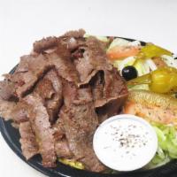 #17 Gyro Plate · Special combination of lamb and beef slow-cooked on a vertical spit. Topped with onions, tom...