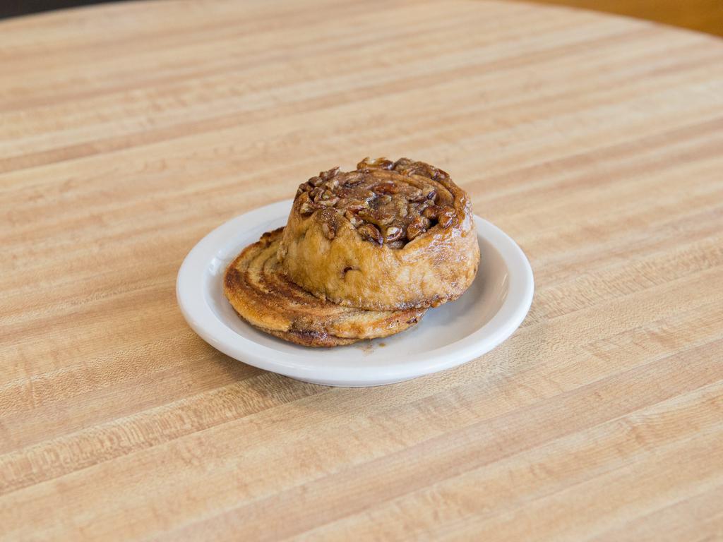 Greatest American Pecan Roll · Our homemade, all-natural pecan roll is sliced, lightly buttered and grilled to a toasty brown perfection. A meal all by itself.