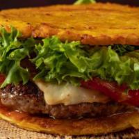 Burguer Patacones · Beef patty : Green Plantain sandwich with Grilled Cheese topped with lettuce, tomato, our si...