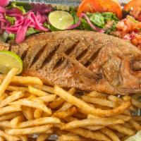 Fried Fish Red Snapper · 1 1/2 - 2 lb. Served with fried plantains or french fries and a portion of green salad.