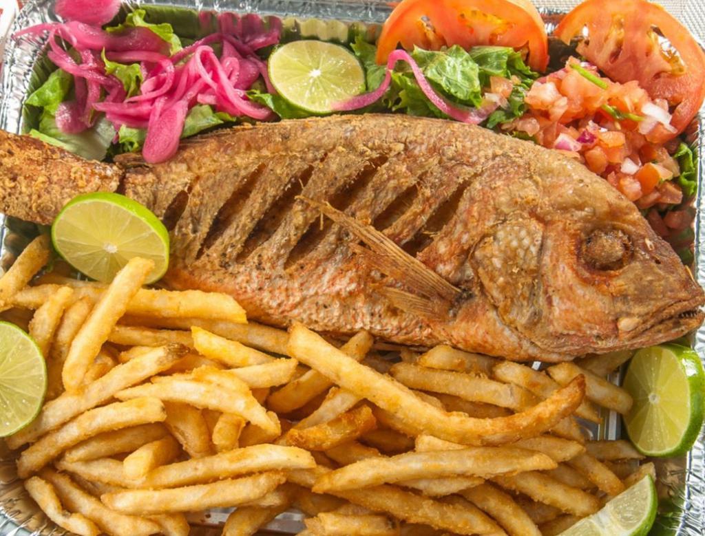 Fried Fish Red Snapper · 1 1/2 - 2 lb. Served with fried plantains or french fries and a portion of green salad.