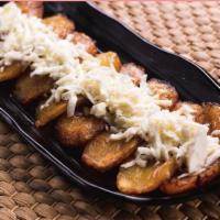 Plantains and Cheese. · Delicious caramelized plantains with white cheese.