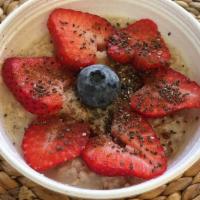 Organic Oatmeal Bowl · Includes 1 fruit choice, chia, honey, and cinnamon.