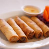 Crispy Spring Roll · Wrapped with shrimp, ground chicken, jelly noodles, carrot and cabbage, served with plum sau...