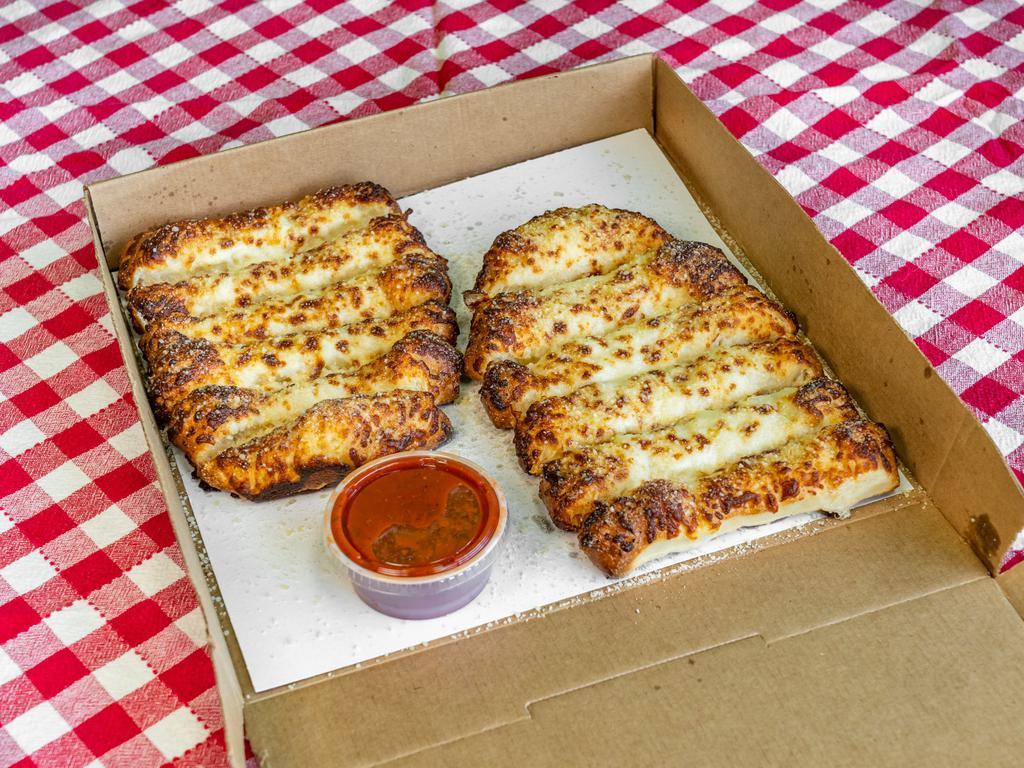 Cheese Dough Stix (12pc) · Freshly baked bread topped with mozzarella, butter, garlic & parmesan romano. Served with pizza sauce side